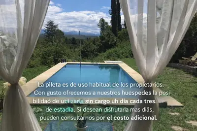 a quote about a swimming pool with a curtain at Balcones de Costa Azul in Villa Carlos Paz