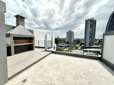 a balcony of a building with a view of a city at Alojamiento entero para 4 personas F in Cordoba