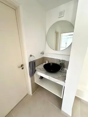 a bathroom with a sink and a mirror at Alojamiento entero para 4 personas F in Cordoba