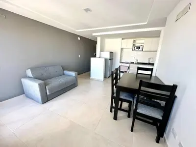 a living room with a table and a couch at Alojamiento entero para 3 personas D in Cordoba