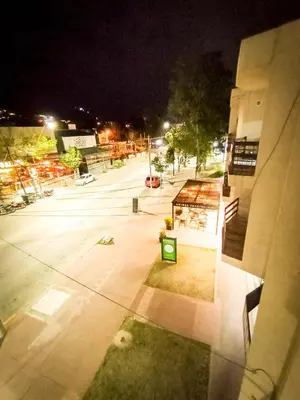 an overhead view of a parking lot at night at Edificio en Avenida Libertad in Villa Carlos Paz