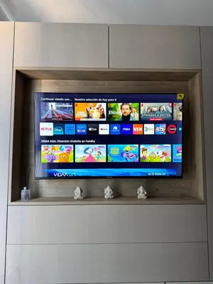 a flat screen tv sitting on top of a shelf at Carlos paz resort premium in Villa Carlos Paz