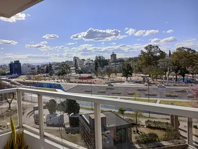 a balcony with a view of a parking lot at Departamento Polanco Tower in Cordoba