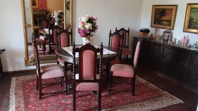 a dining room with a table and chairs at Acogedora Casa Familiar en Zona Residencial in Cordoba