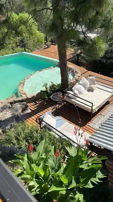 an overhead view of a swimming pool with a deck at Casa de ensueño in Villa Carlos Paz