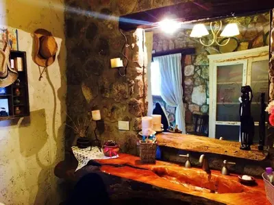 a bathroom with a sink and a mirror at Casa de ensueño in Villa Carlos Paz