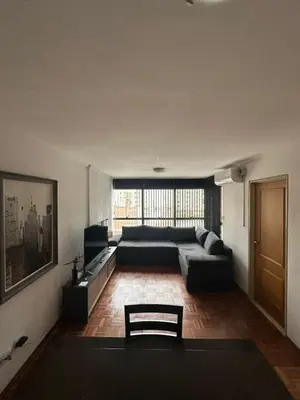 a living room with a couch and a table at Departamento alquiler temporal 6 D INVERHOME INMOBILIARIA in Cordoba