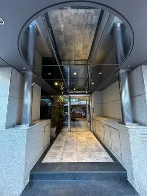 a hallway in a building with a circular window at Departamento alquiler temporal 6 D INVERHOME INMOBILIARIA in Cordoba