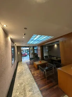 a living room with a skylight in a building at Departamento alquiler temporal 6 D INVERHOME INMOBILIARIA in Cordoba
