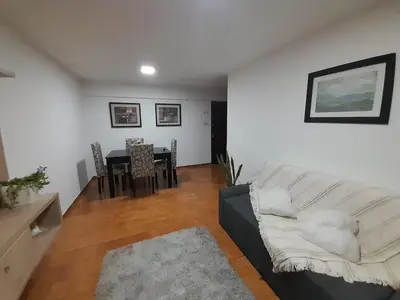 a living room with a couch and a table at Osveli in Cordoba