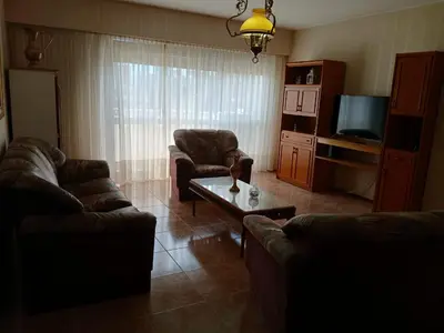a living room with two couches and a coffee table at Adrimar Cordoba Centro in Cordoba