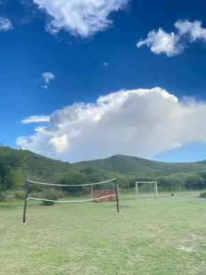 a soccer goal in the middle of a field at Cabañas Los Mellis in Barrio Parque El Corcovado