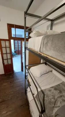 a couple of bunk beds sitting in a room at WHY NOT NUEVA CORDOBA in Cordoba