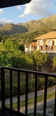 a view of the mountains from the balcony of a house at INCA HUASI - Cabañas de Altura in El Rincón