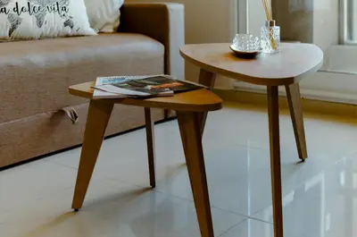 two tables in a living room next to a couch at TempoHome in Cordoba