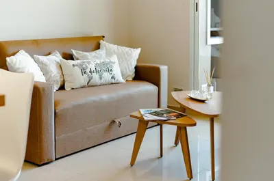 a living room with a couch and a table at TempoHome in Cordoba