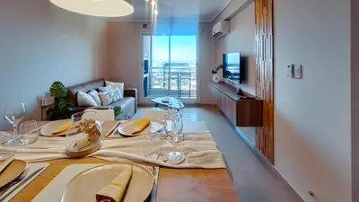 a dining room with a table with wine glasses at TempoHome in Cordoba