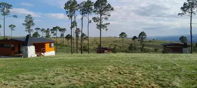 a house in the middle of a field at La Eugelina in Santa Rosa de Calamuchita