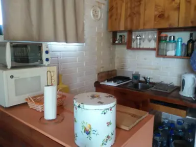 a kitchen counter with a cake on top of it at Casitas del Lago in Potrero de Garay