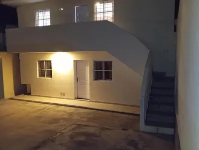 an empty room with a staircase in a building at Flor del Aromito in Alta Gracia