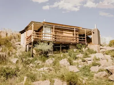 an old house sitting on top of a hill at Aldea Romerillo in Cavalango