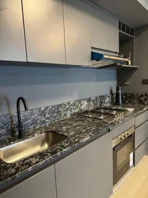 a kitchen with a sink and a counter top at Alquiler Ituzaingo 665 in Cordoba