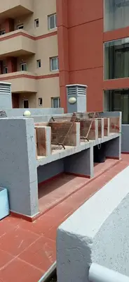 a bench on the side of a building at Terraza Terraza in Villa Carlos Paz