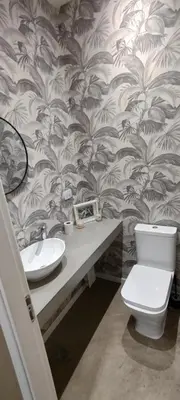 a bathroom with a toilet and a sink at Alquiler Casa Exclusivo Country Causana 6 Personas en Villa Carlos Paz in Villa Carlos Paz