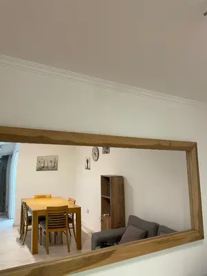 a living room with a table and a couch at Departamento Nueva Cordoba in Cordoba
