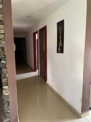 a hallway of a house with a picture on the wall at Mi casita en Embalse in Embalse