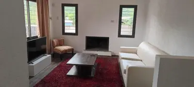 a living room with a couch and a coffee table at Casa villa el diquecito in La Calera