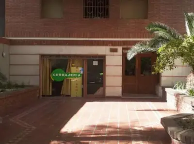 a building with a sign on the front of it at Super Depto Balcarce 455 in Cordoba