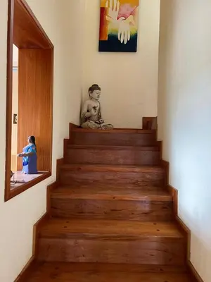 a set of stairs with a statue of a boy on it at Mansion de Potrero in La Estancia