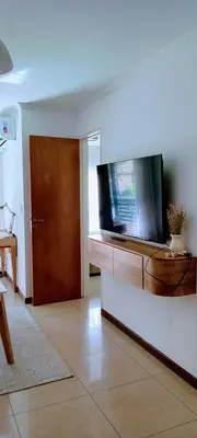 a living room with a flat screen tv on a counter at Nórdico Nueva Córdoba in Cordoba
