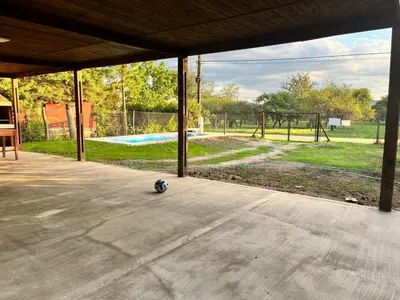 a soccer ball sitting on the ground in a pavilion at Adonay VGB in Villa General Belgrano