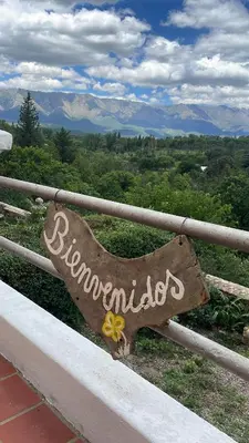 a sign that reads blimnanthedon istg istg istg istg at La casona del rio in Nono