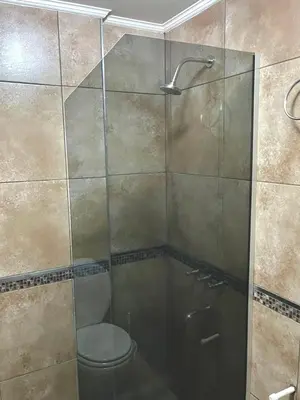 a bathroom with a shower with a toilet in it at depto en edificio miralejos 8 in Cordoba