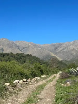 a dirt road with mountains in the background at Escapada romántica en El Leon in San Javier