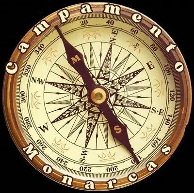 a close up of a gold clock with auminati at Campamento Monarcas in Villa Carlos Paz