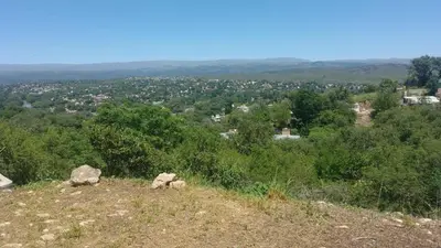 a view of a city from the top of a hill at Campamento Monarcas in Villa Carlos Paz