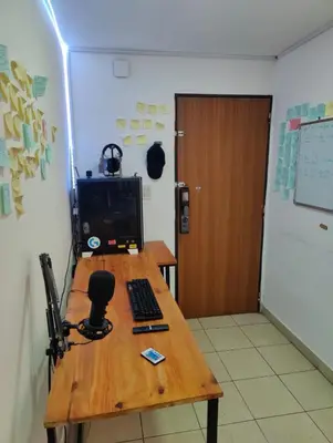 a desk with a computer on it in a room at Departamento de lujo en Nueva Cordoba in Cordoba