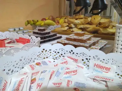 a buffet with different types of food on a table at Hotel Nuevo Fatica in Villa Carlos Paz