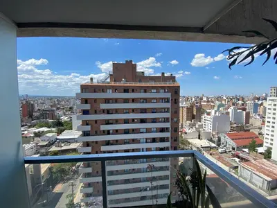 a view of a city from the balcony of a building at Espacio C Jardín con estacionamiento in Cordoba