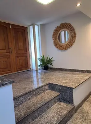 a room with stairs and a mirror on the wall at Casa Spilimbergo in Cordoba