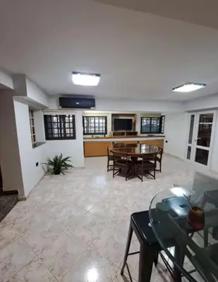 a large living room with a table and chairs at Casa Spilimbergo in Cordoba
