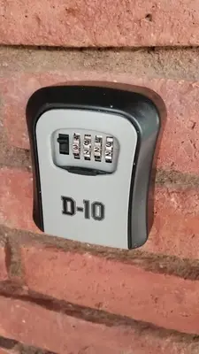 a do not disturb button on a brick wall at Casa Marie in Villa del Dique