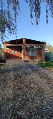 a brick building with a lot of windows at Casa Marie in Villa del Dique