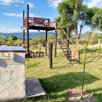 a playground with a slide in a park at Nápoles in Santa Rosa de Calamuchita