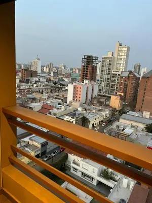 a view of a city from a balcony at Departamento amoblado 1 dormitorio Río 4 in Río Cuarto