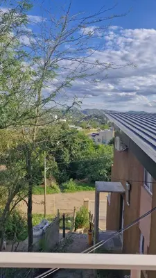 a view of a yard from a house at Dúplex La Delfina 3 in Villa Carlos Paz